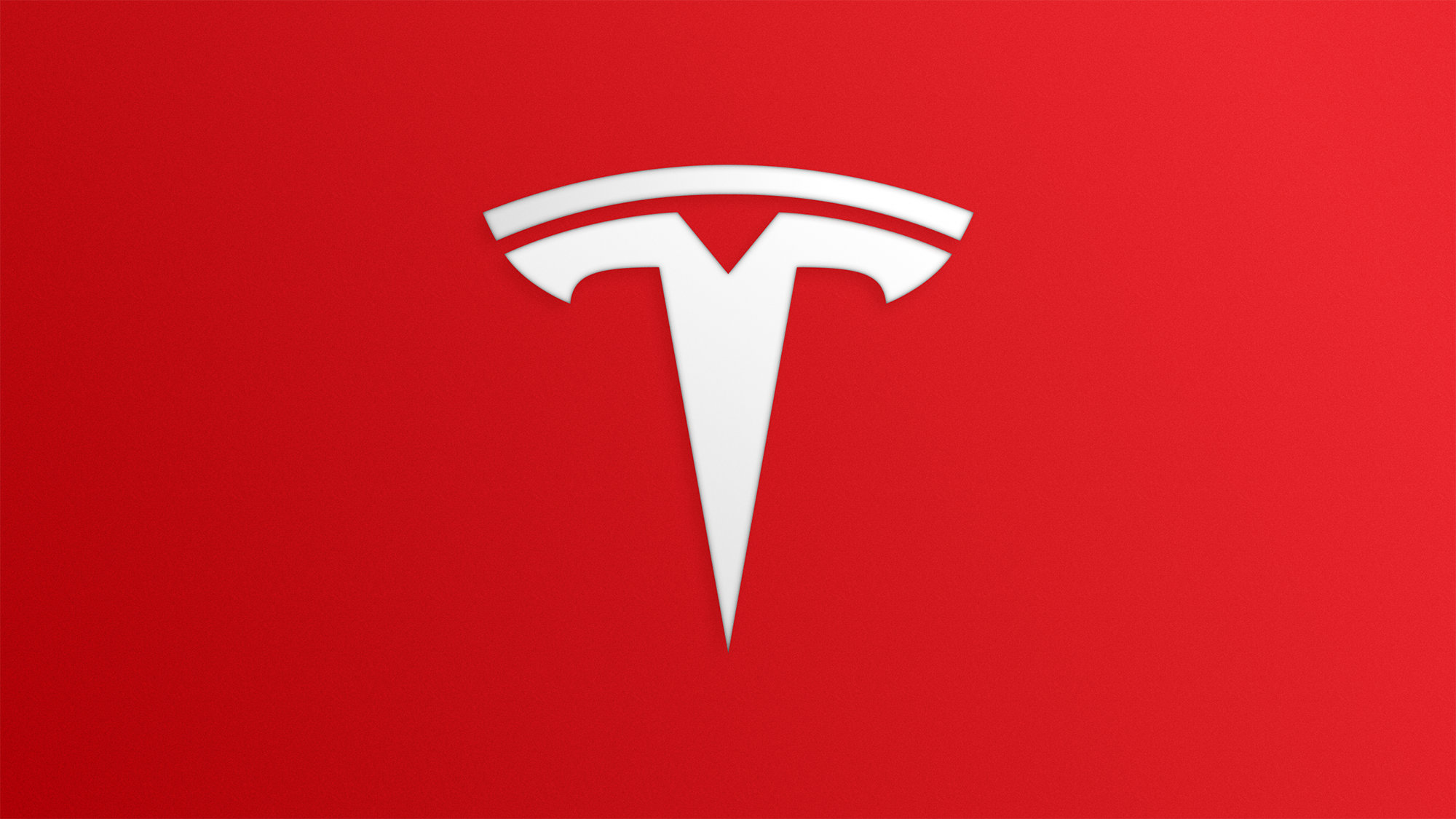 The iconic Tesla logo on a soft red gradient background